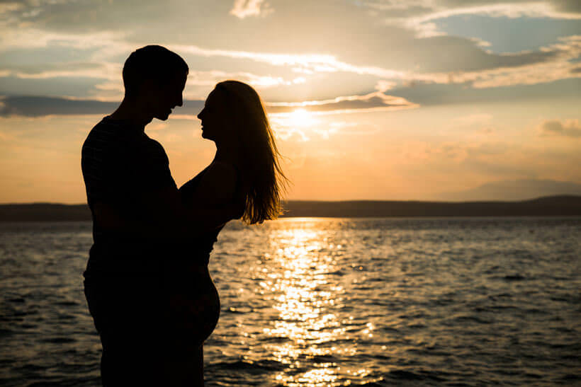 Couple in love silhouette shadow, holding, kissing