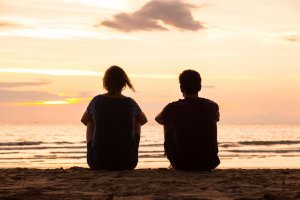 Couple talking at the beach